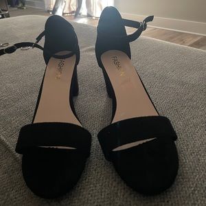 Black heels, never worn